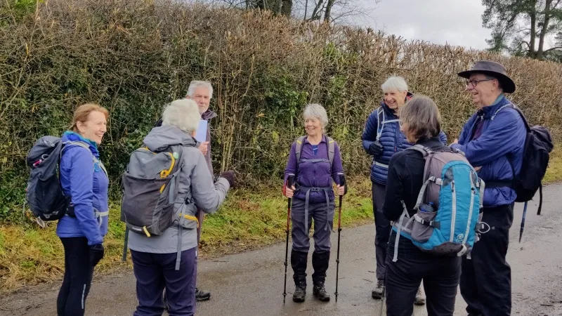 Community members gathered at a walk starting point